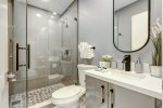 Full-bathroom features a frameless shower -easy accessibility-